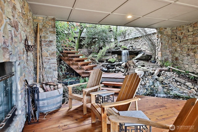 wooden deck featuring stairway