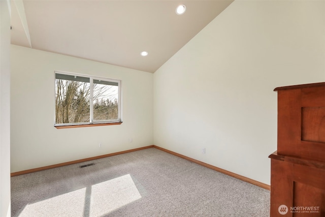 unfurnished room featuring baseboards, visible vents, lofted ceiling, carpet flooring, and recessed lighting