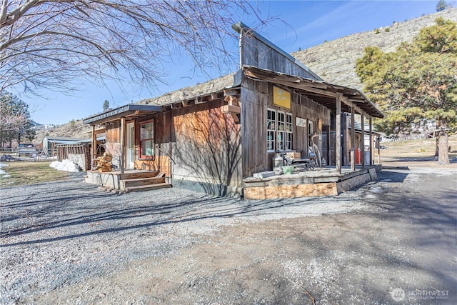 view of home's exterior featuring a mountain view