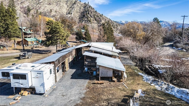 drone / aerial view featuring a mountain view