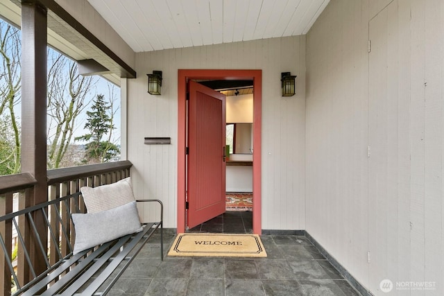 property entrance with a balcony