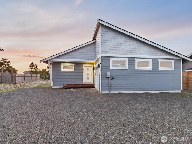 exterior space with fence and a deck