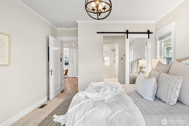 bedroom with a barn door, light carpet, visible vents, baseboards, and ornamental molding