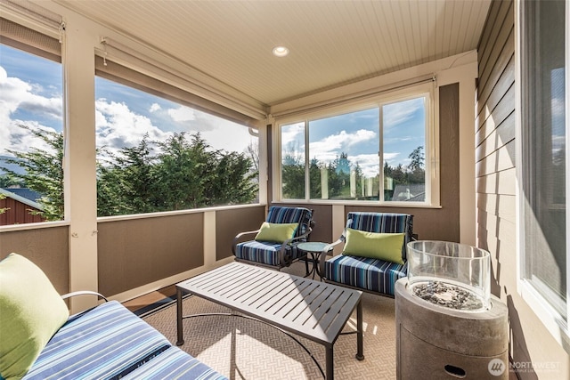 sunroom / solarium with wooden ceiling