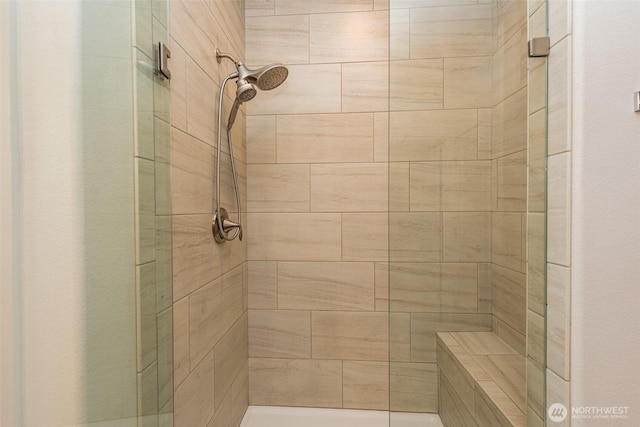 bathroom featuring a shower stall