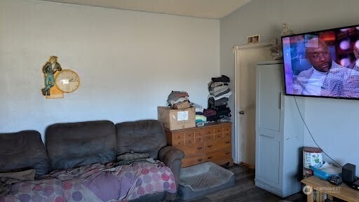 bedroom featuring wood finished floors