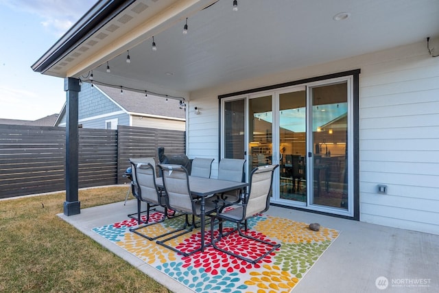 view of patio / terrace with fence and outdoor dining space