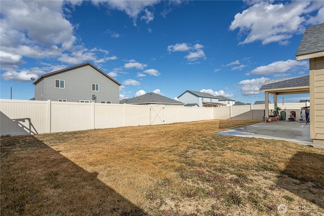 view of yard featuring a fenced backyard and a patio area