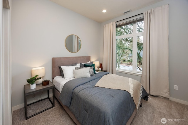 bedroom featuring carpet, visible vents, baseboards, and recessed lighting