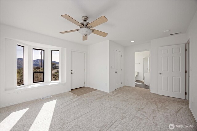 133 Long Dr, Chelan, WA 98816 - interior space featuring visible vents, baseboards, a ceiling fan, and light colored carpet