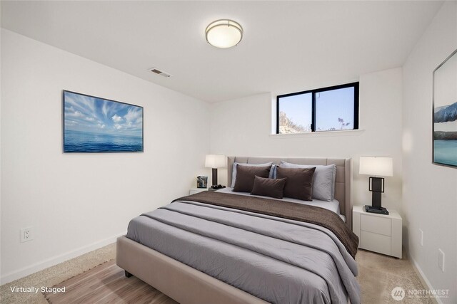 133 Long Dr, Chelan, WA 98816 - bedroom with visible vents, baseboards, and light carpet