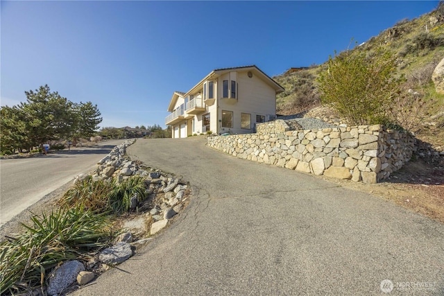 133 Long Dr, Chelan, WA 98816 - exterior space with a garage and aphalt driveway