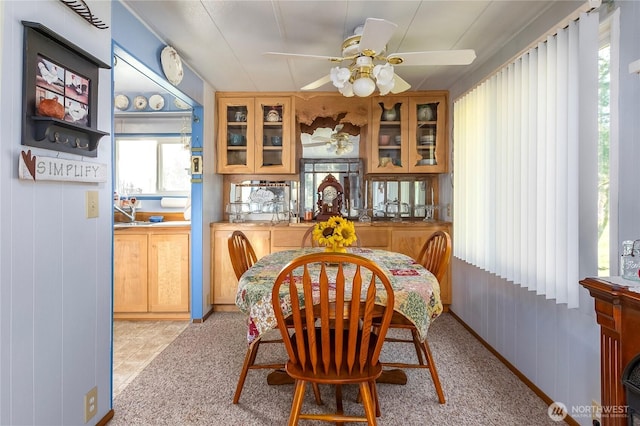 dining area featuring a ceiling fan