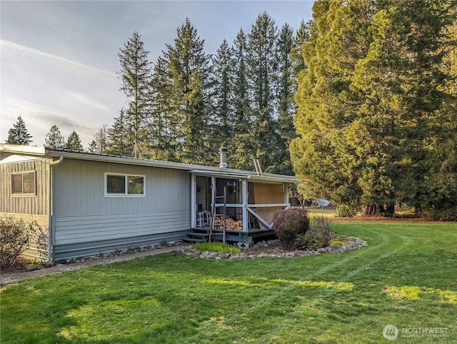 view of front of house with a front lawn