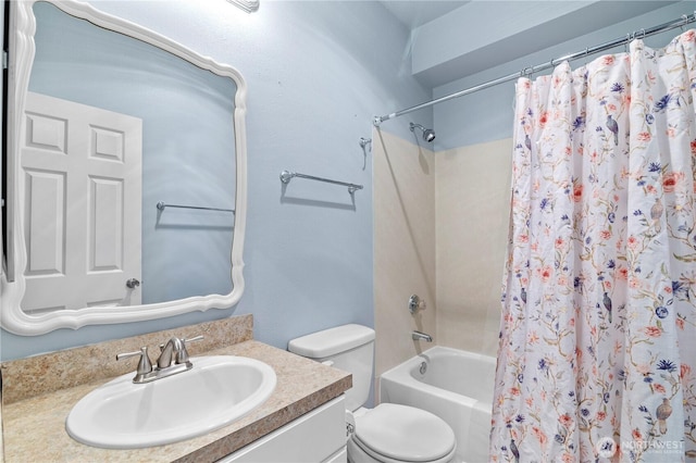 bathroom with toilet, shower / bath combo with shower curtain, and vanity