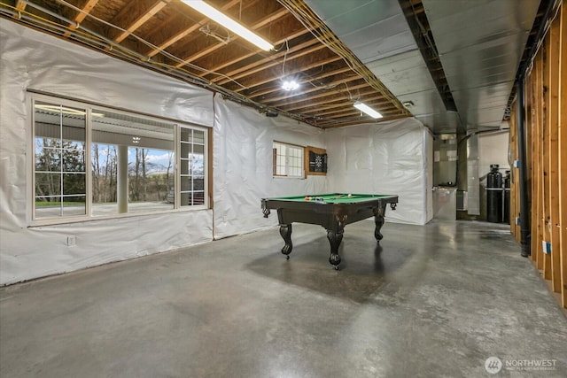 game room with concrete floors and billiards