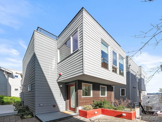 view of front of house featuring brick siding