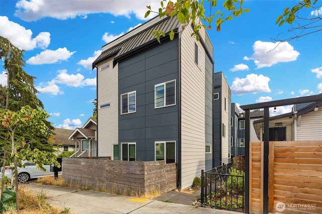 view of home's exterior featuring a fenced front yard