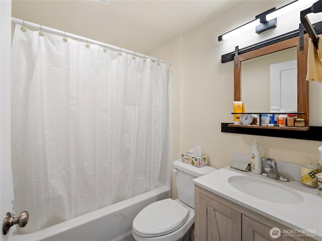 full bath with toilet, shower / bath combination with curtain, and vanity