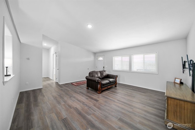 sitting room with recessed lighting, dark wood finished floors, and baseboards