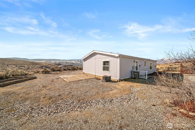 exterior space featuring central AC unit