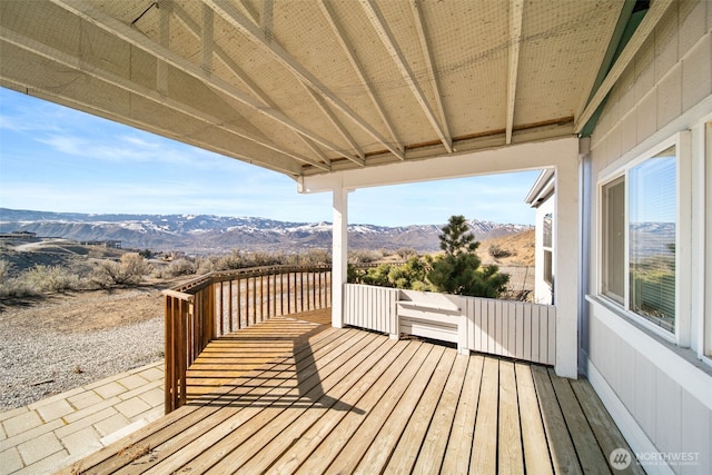 wooden terrace with a mountain view