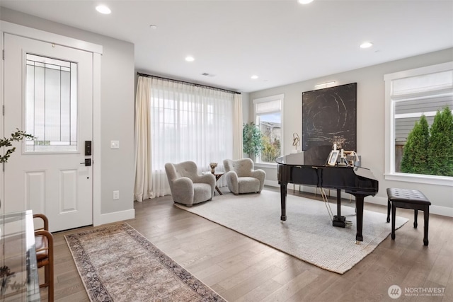 foyer entrance featuring recessed lighting, baseboards, and wood finished floors