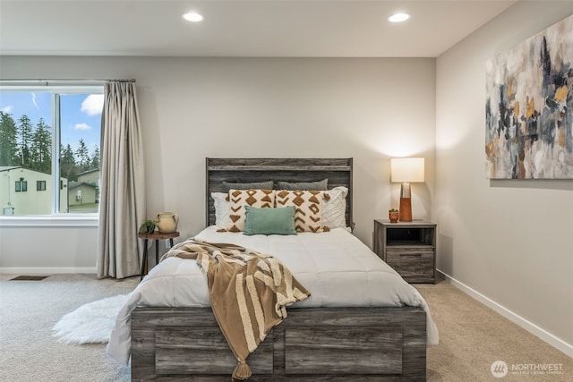 carpeted bedroom with visible vents, recessed lighting, and baseboards