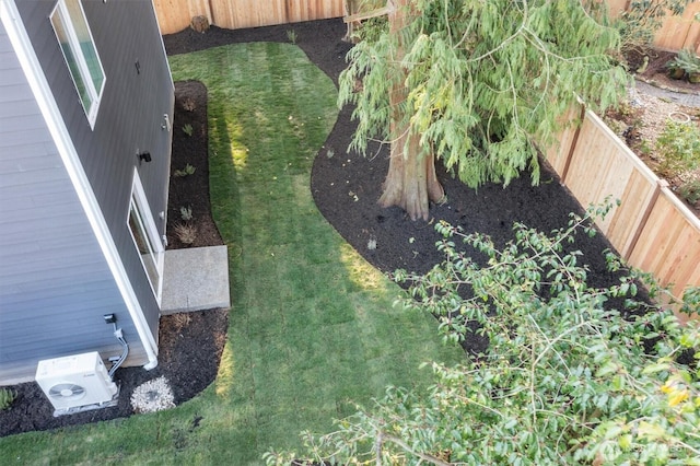 view of yard with a fenced backyard