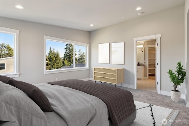 bedroom featuring baseboards, carpet floors, and recessed lighting