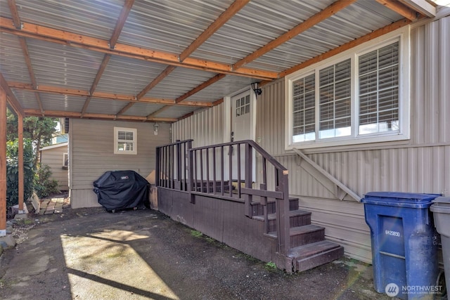 exterior space with a carport