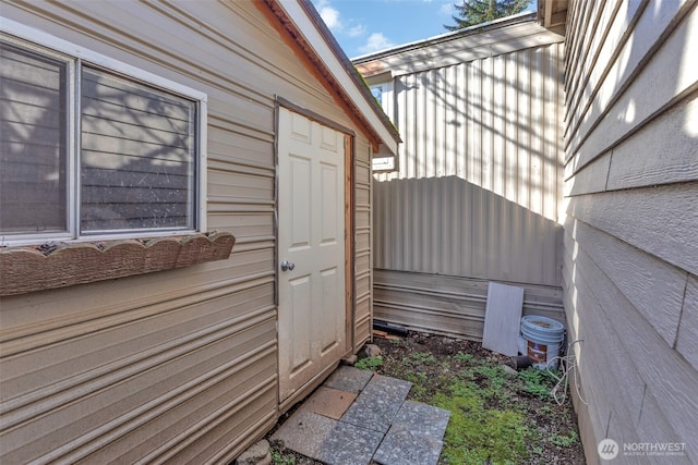 view of property exterior with fence