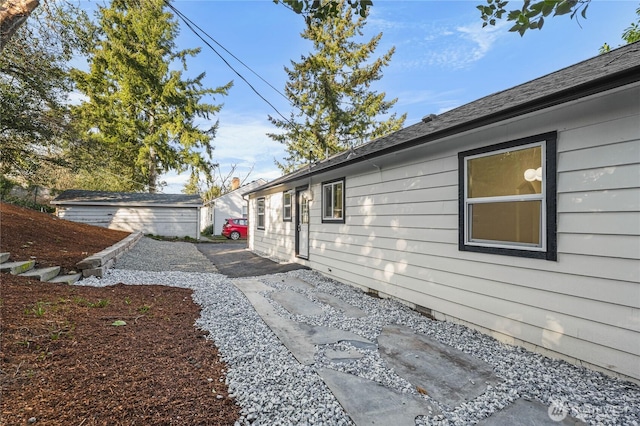 view of home's exterior featuring crawl space and a patio area