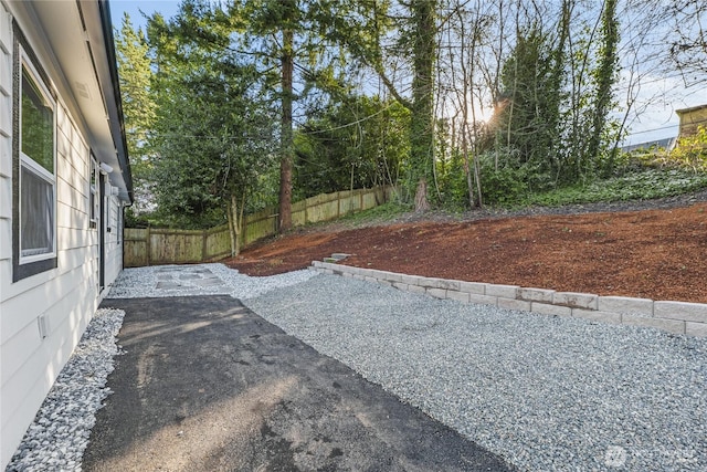 view of yard featuring a patio area and fence