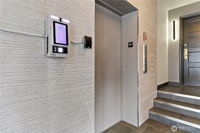 doorway to property with elevator