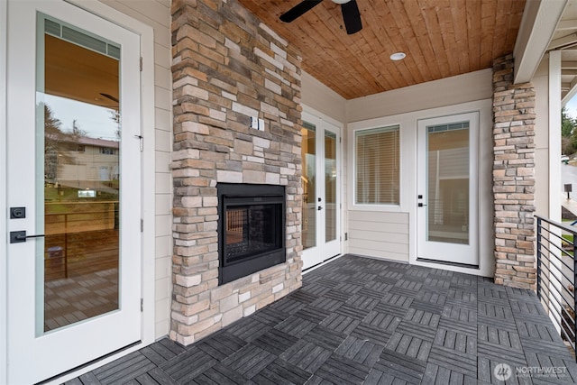 interior space featuring a ceiling fan and french doors