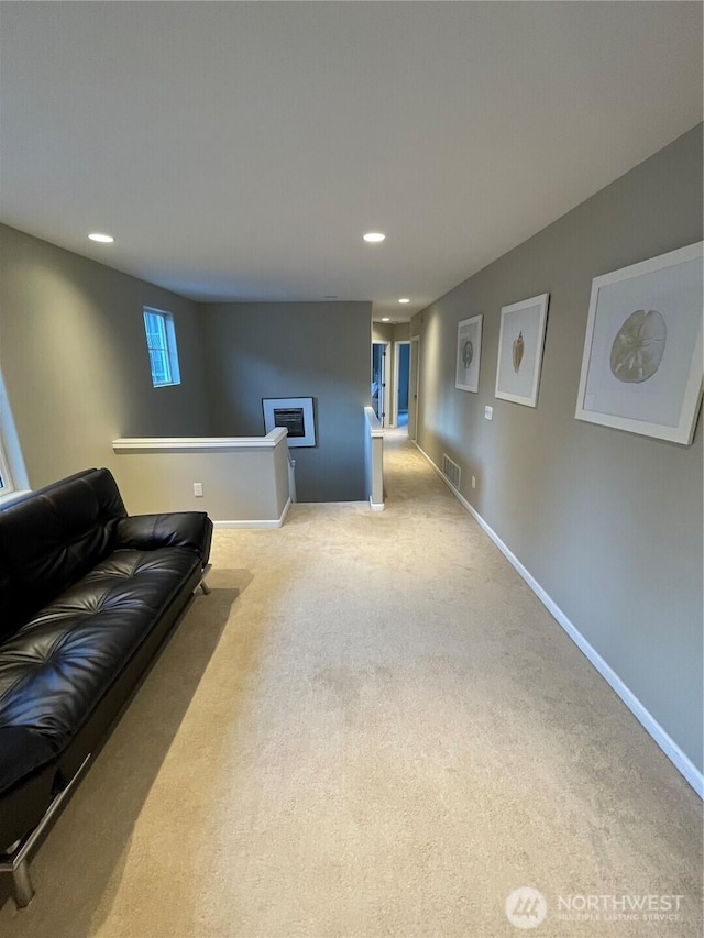 living room with carpet, a fireplace, recessed lighting, visible vents, and baseboards