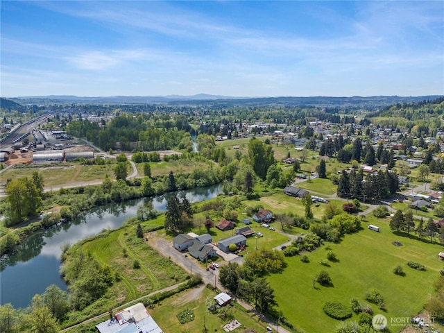bird's eye view with a water view