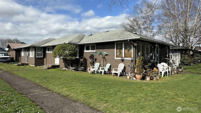 exterior space with a front lawn