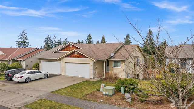 view of front of home with an attached garage and driveway