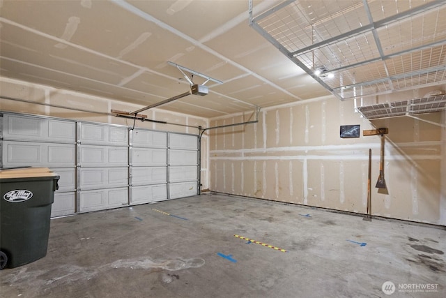 garage featuring a garage door opener