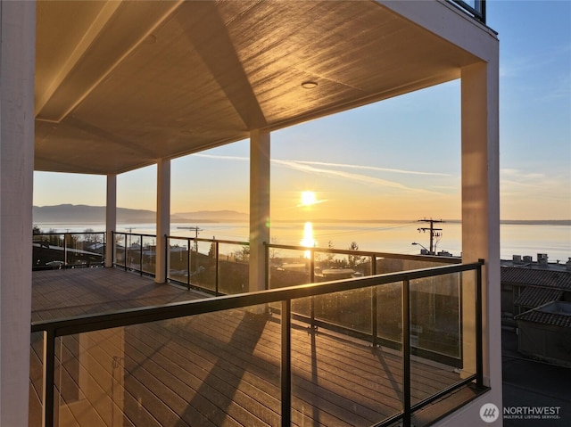 deck featuring a water view