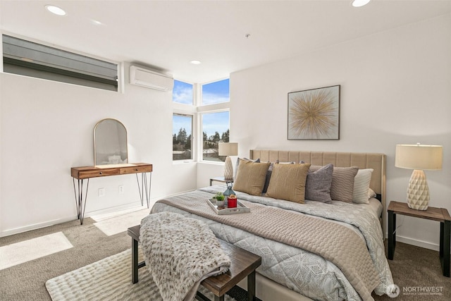 carpeted bedroom with baseboards, an AC wall unit, and recessed lighting