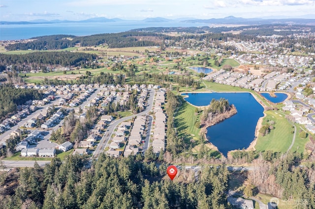 aerial view with a residential view and a water and mountain view