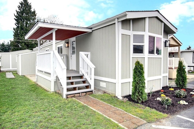 exterior space featuring crawl space and a lawn