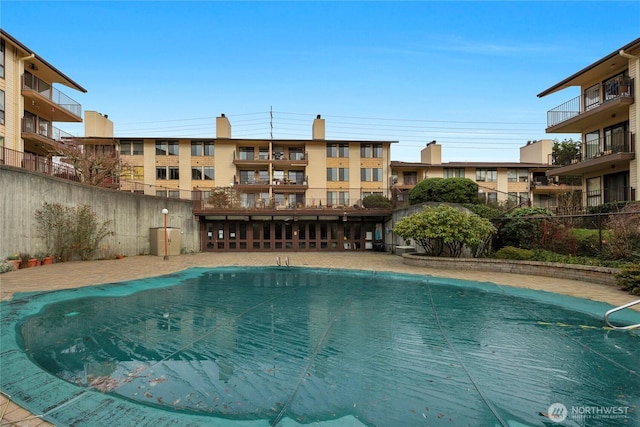 pool featuring fence