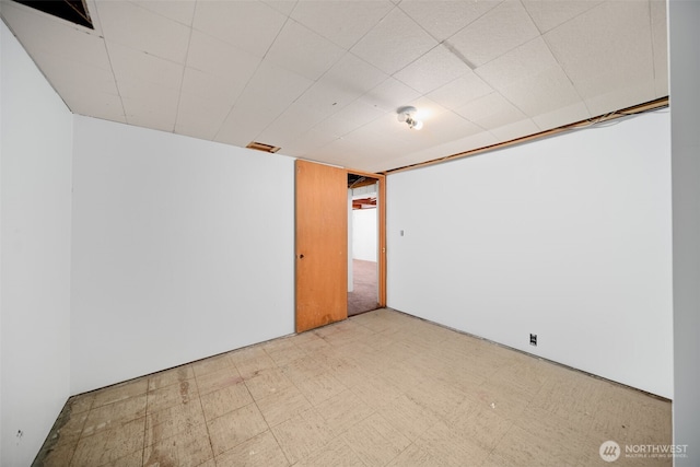 empty room with tile patterned floors