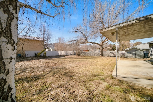 view of yard featuring a patio area and fence