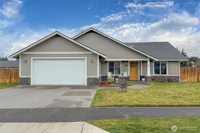 craftsman house featuring stone siding, a front yard, and fence