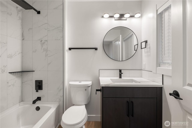 full bathroom with vanity, toilet, and tub / shower combination